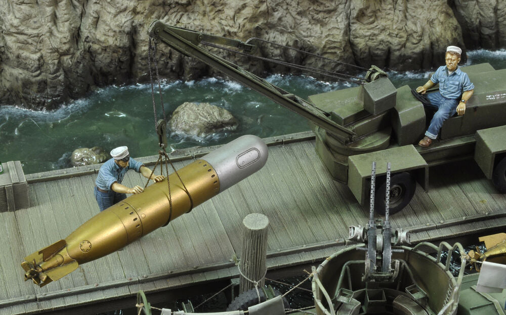 U.S. sailors loading torpedo-WWII